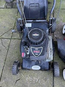 2 petrol lawn mowers spares or repairs