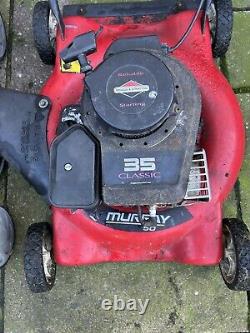 2 petrol lawn mowers spares or repairs