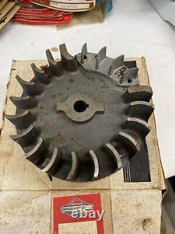 Briggs Stratton 394424 flywheel assembly with aluminum ring gear NOS