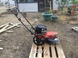 Briggs & Stratton strimmer machine. Hardly used in excellent condition