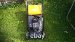 Petrol lawn mower, black fully working, good condition